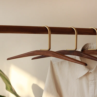 Brass and Black Walnut Wood Clothes Hangers | Coat Hangers | Clothes Hangers | Pant Hangers | Trouser Hangers | Closet Hanger | Wardrobe Hangers | Hangers for Closet | Suit Hangers | Shirt Hangers | Luxury Wardrobe | Stylish Wardrobe | Buy Display Clothes Hangers Online Now at Estilo Living