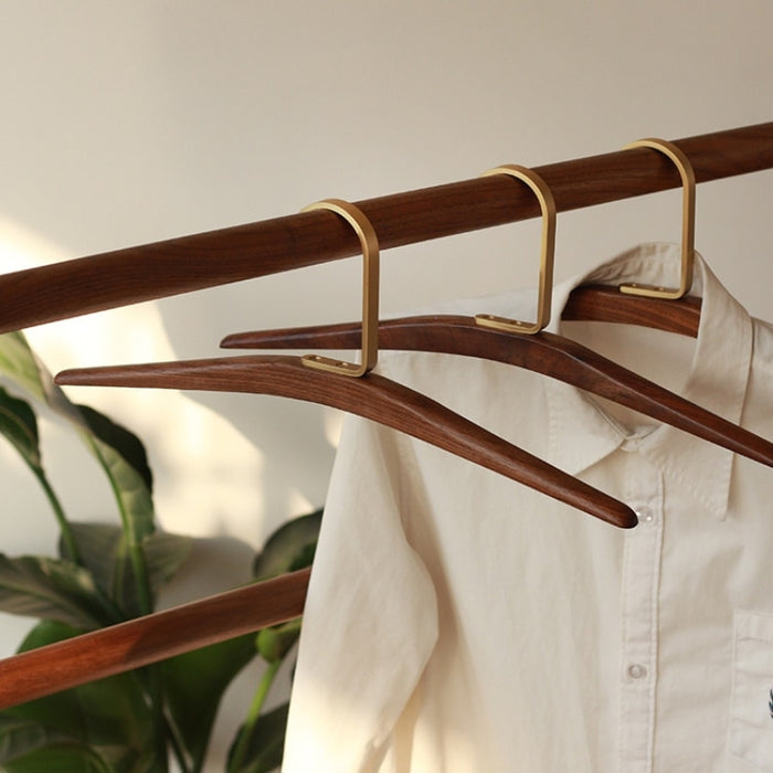 Brass and Black Walnut Wood Clothes Hangers | Coat Hangers | Clothes Hangers | Pant Hangers | Trouser Hangers | Closet Hanger | Wardrobe Hangers | Hangers for Closet | Suit Hangers | Shirt Hangers | Luxury Wardrobe | Stylish Wardrobe | Buy Display Clothes Hangers Online Now at Estilo Living