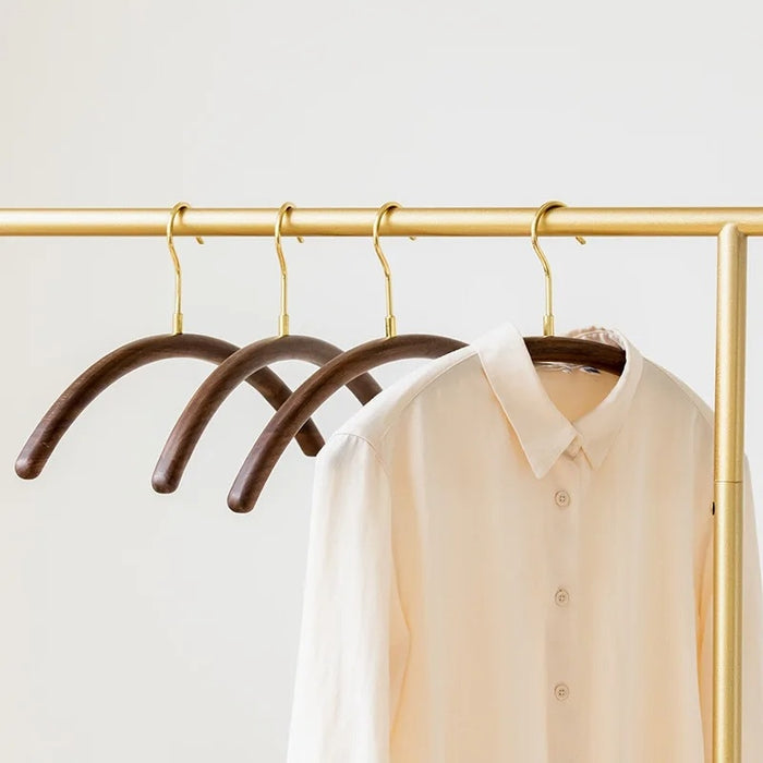 Curved Brass and Black Walnut Wood Clothes Hangers | Coat Hangers | Clothes Hangers | Pant Hangers | Trouser Hangers | Closet Hanger | Wardrobe Hangers | Hangers for Closet | Suit Hangers | Shirt Hangers | Luxury Wardrobe | Stylish Wardrobe | Buy Display Clothes Hangers Online Now at Estilo Living