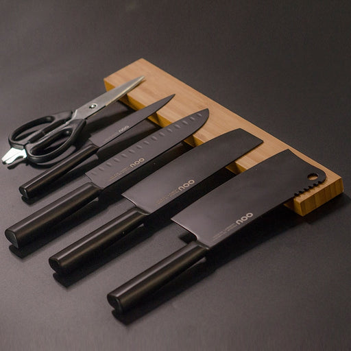 Knives being stored on The Butler Wall Mounted Magnetic Knife Rack - Kitchen Storage - Estilo Living