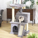 Cute cat using the Cat Condo Climbing Cat Tree with Scratching Posts in Gray color from Estilo Living, Buy Cat Climbing Tree with Cat Scratching Post Online Now!