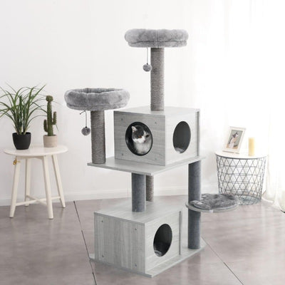 Cute cate using the Cat Tower with Duel Cat Condos & Cat Nests, Buy Climbing Cat Tree Online Now from Estilo Living